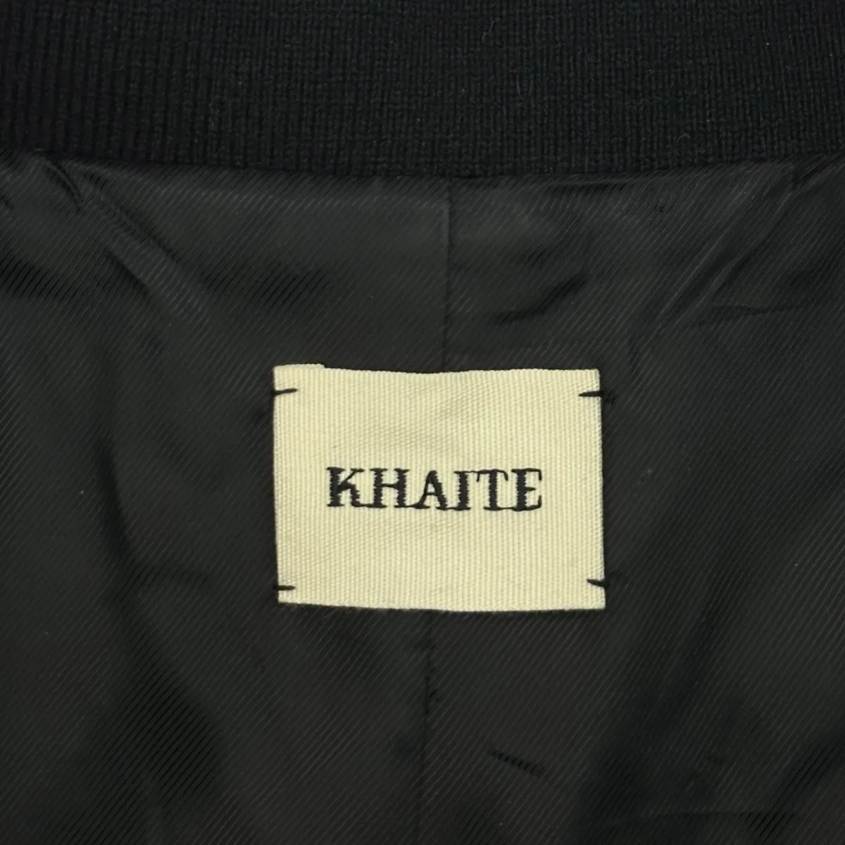 Khaite black leather cropped bomber jacket